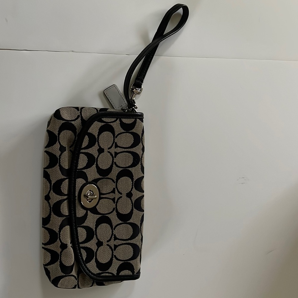Small Coach black/grey clutch or wristlet. Gently used